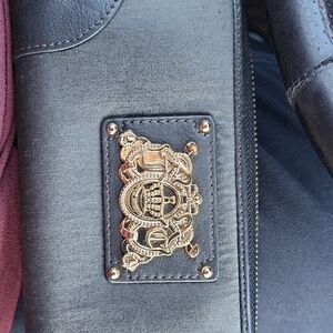 Juicy Couture Black Leather Clutch with Gold Crest Plaque